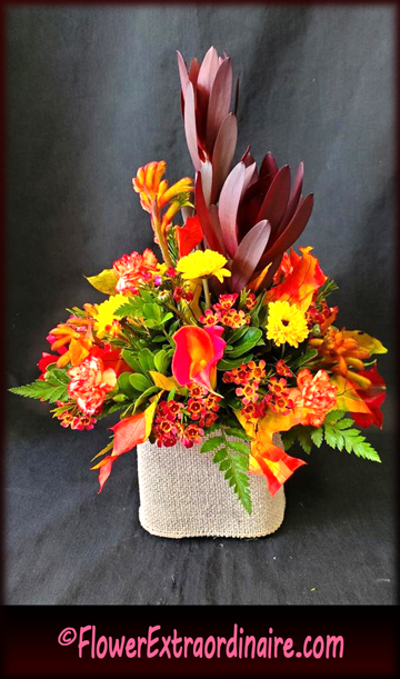 yellow, orange, burgandy fall and Thanksgiving floral arrangement