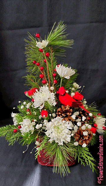 red and white floral arrangement with cardinal