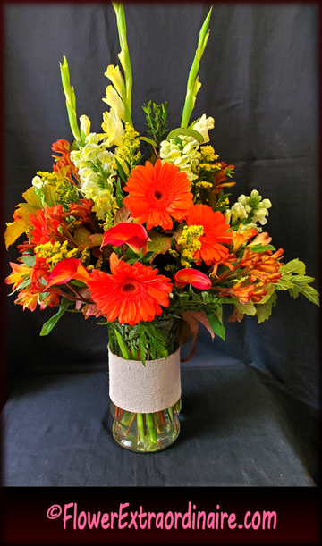 orange and white and peach flowers in vase
